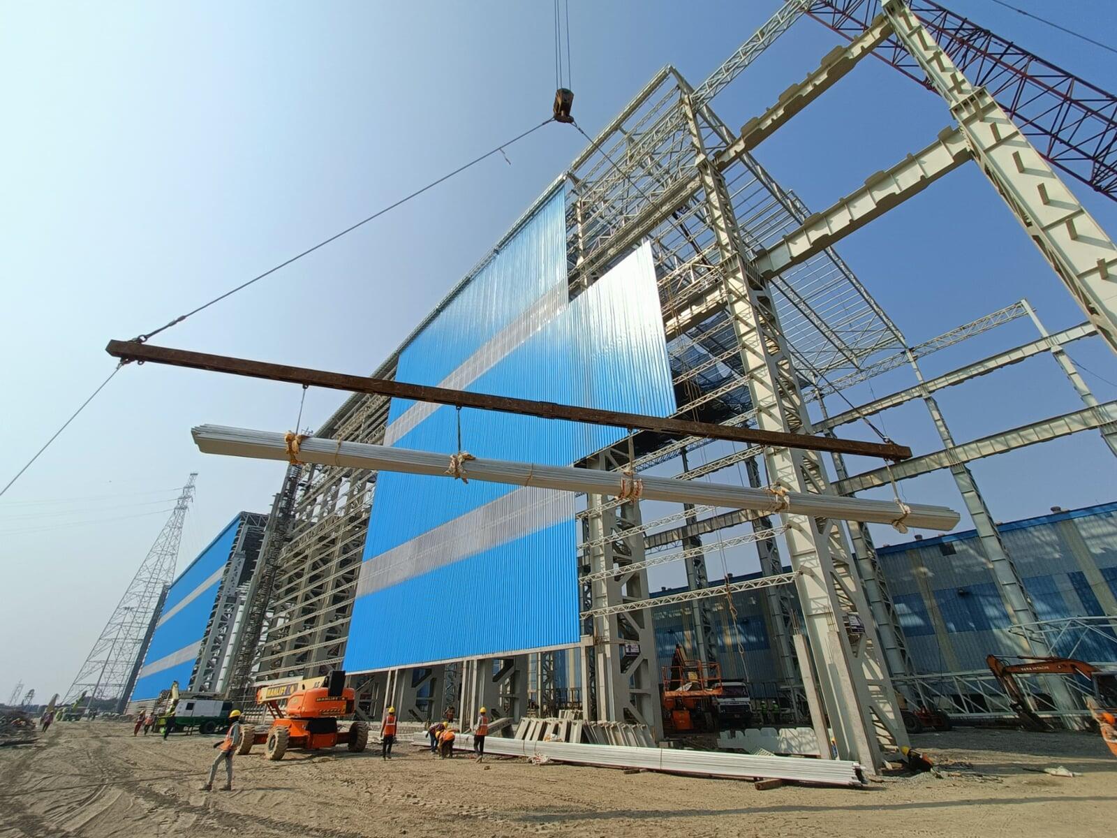Architectural standing seam roofing for Lodha Mumbai: Premium metal building envelope featuring a minimalist aesthetic and hidden fastener technology by Rishonn & Reyansh.